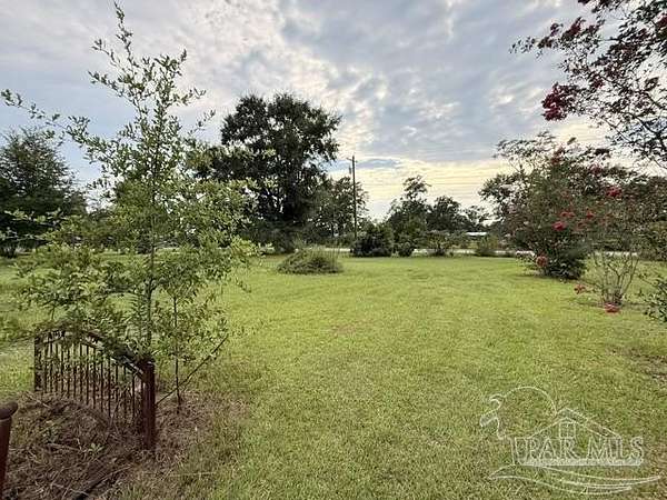 4.62 Acres of Land with Home for Sale in Molino, Florida