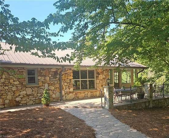 7.85 Acres of Land with Home for Sale in Walnut Cove, North Carolina