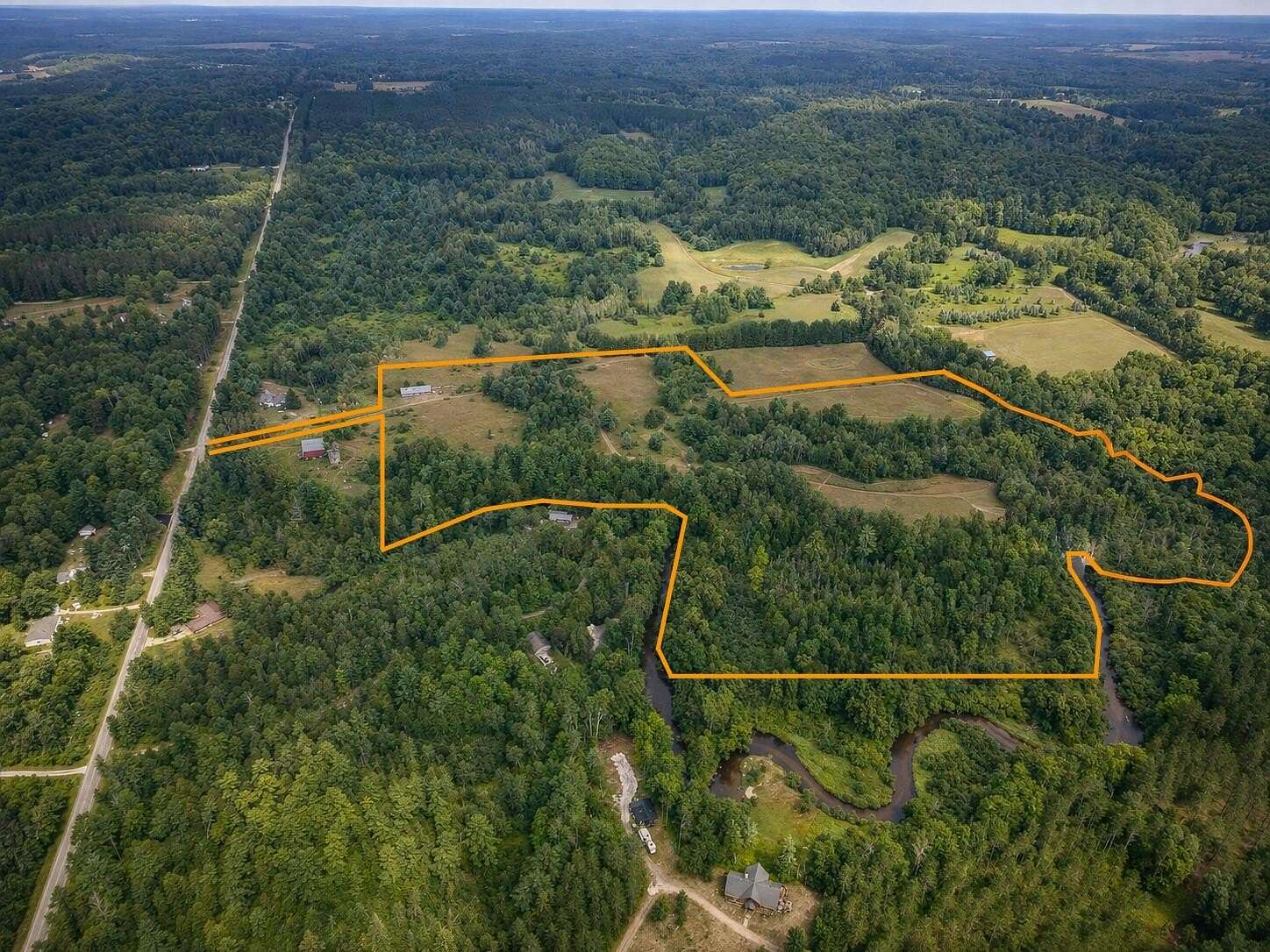 34.5 Acres of Recreational Land with Home for Sale in Luther, Michigan