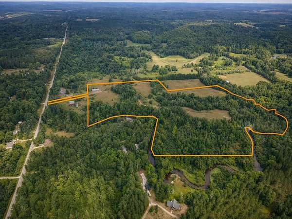 34.5 Acres of Recreational Land with Home for Sale in Luther, Michigan