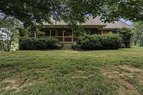 1.87 Acres of Land with Home for Sale in Scottsville, Kentucky