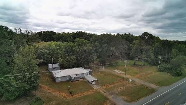 1.5 Acres of Land with Home for Sale in De Valls Bluff, Arkansas