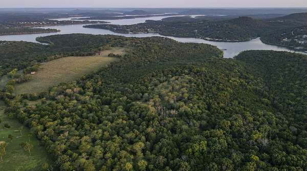 155 Acres of Land for Sale in Lampe, Missouri
