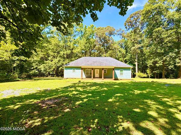 9.3 Acres of Land with Home for Sale in Forsyth, Georgia