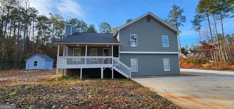 2 Acres of Land with Home for Lease in Powder Springs, Georgia