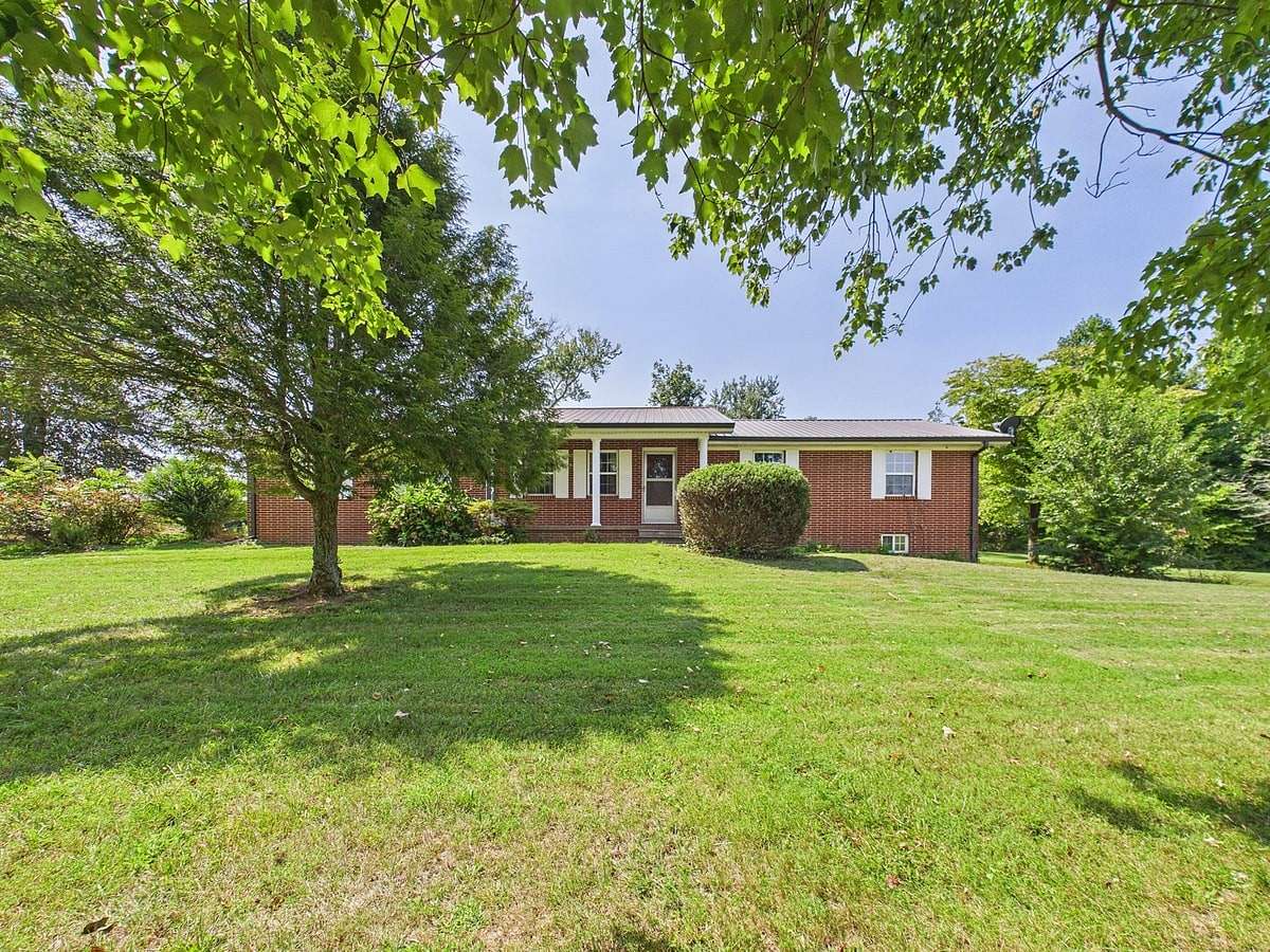 3.56 Acres of Land with Home for Sale in Madisonville, Tennessee