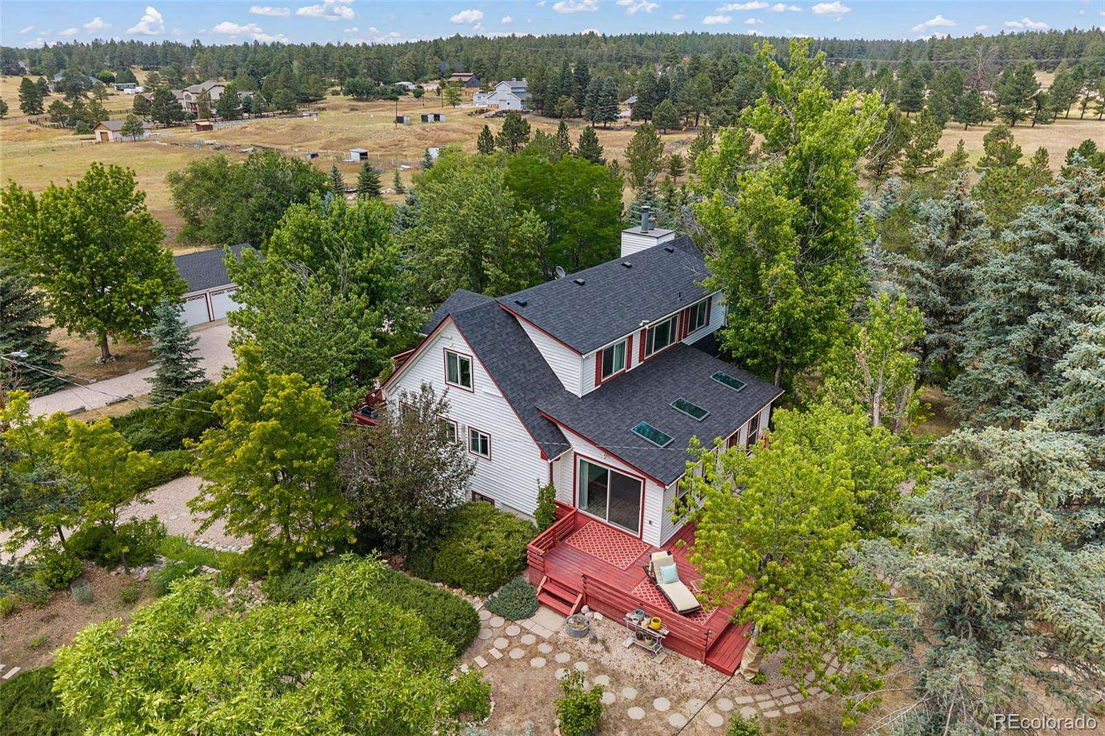 13.5 Acres of Land with Home for Sale in Franktown, Colorado