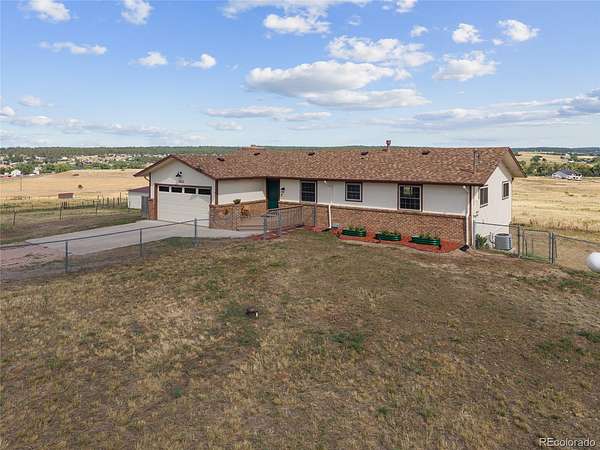 10.6 Acres of Land with Home for Sale in Franktown, Colorado