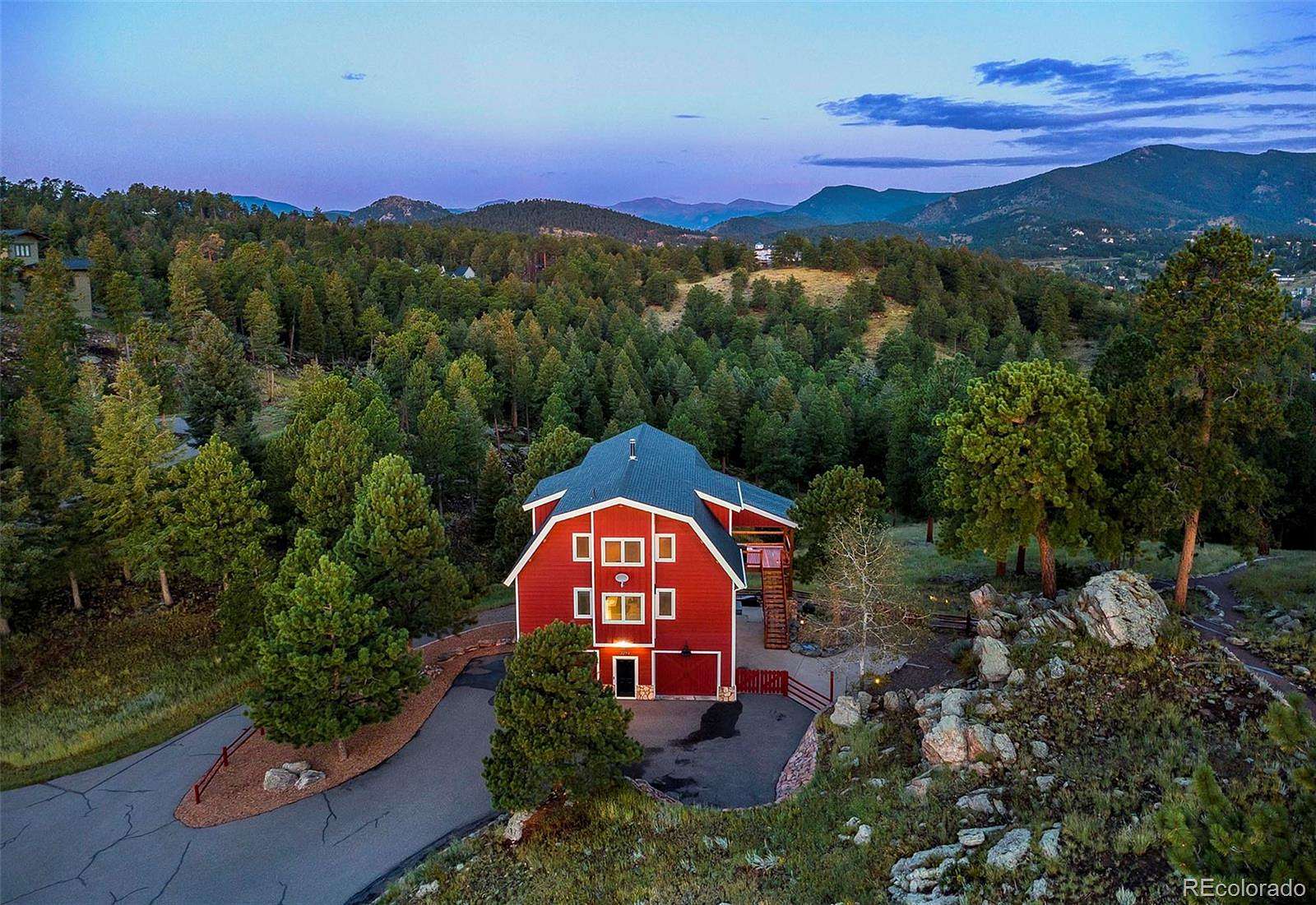 10.9 Acres of Recreational Land with Home for Sale in Evergreen, Colorado