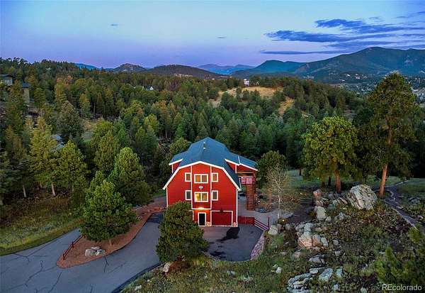 10.9 Acres of Recreational Land with Home for Sale in Evergreen, Colorado