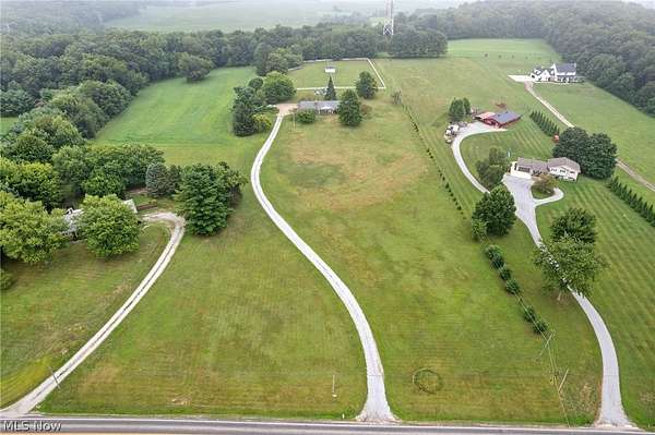 6 Acres of Land with Home for Auction in Dalton, Ohio