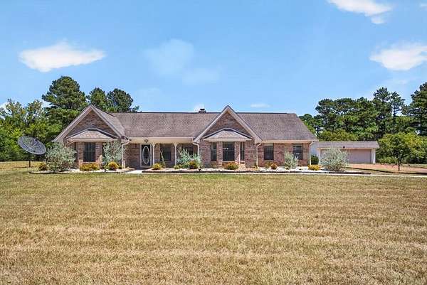 7 Acres of Land with Home for Sale in Crockett, Texas