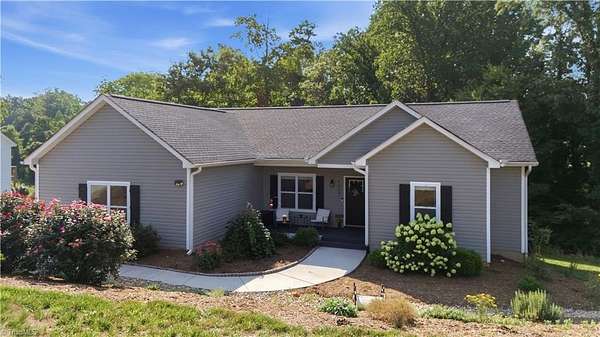 3 Acres of Land with Home for Sale in Summerfield, North Carolina