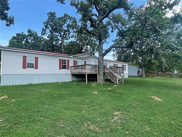 11.9 Acres of Land with Home for Sale in Eureka Springs, Arkansas