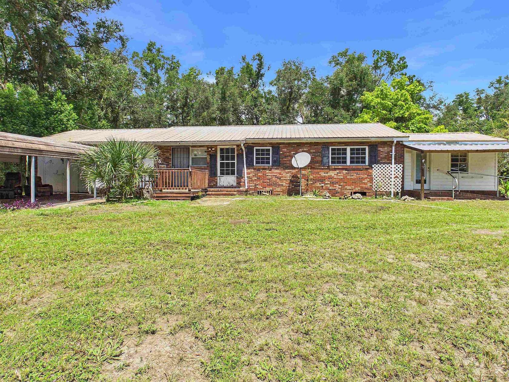 1.68 Acres of Land with Home for Sale in Perry, Florida