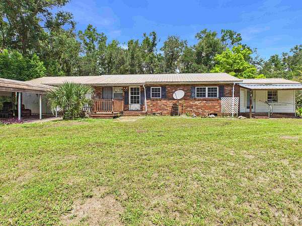 1.68 Acres of Land with Home for Sale in Perry, Florida