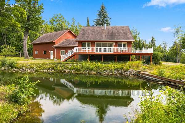 10.3 Acres of Land with Home for Sale in Indian River, Michigan