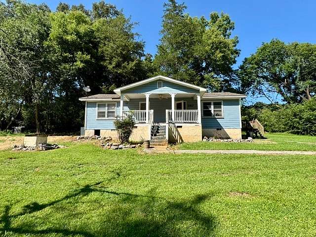 1.5 Acres of Land with Home for Sale in Benton, Tennessee