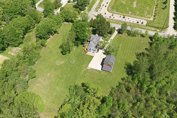 6.7 Acres of Land with Home for Sale in Lakeside, Michigan