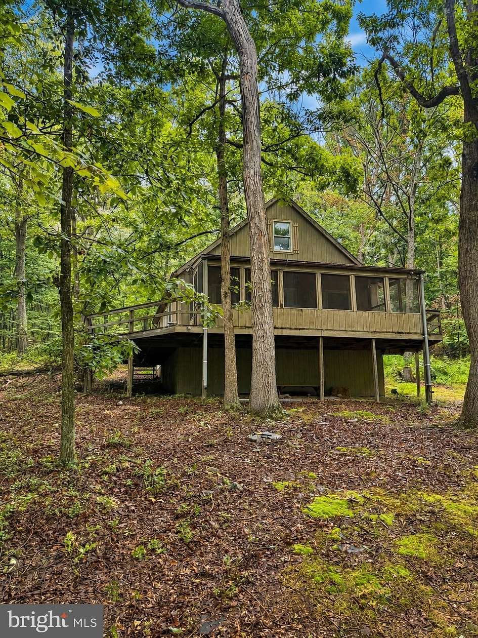 7.4 Acres of Land with Home for Sale in Paw Paw, West Virginia