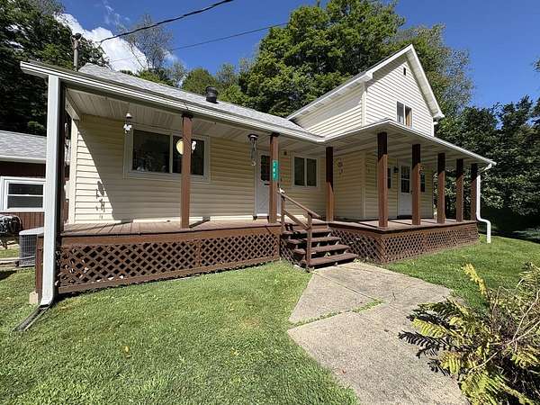 6.4 Acres of Land with Home for Sale in Oil City, Pennsylvania