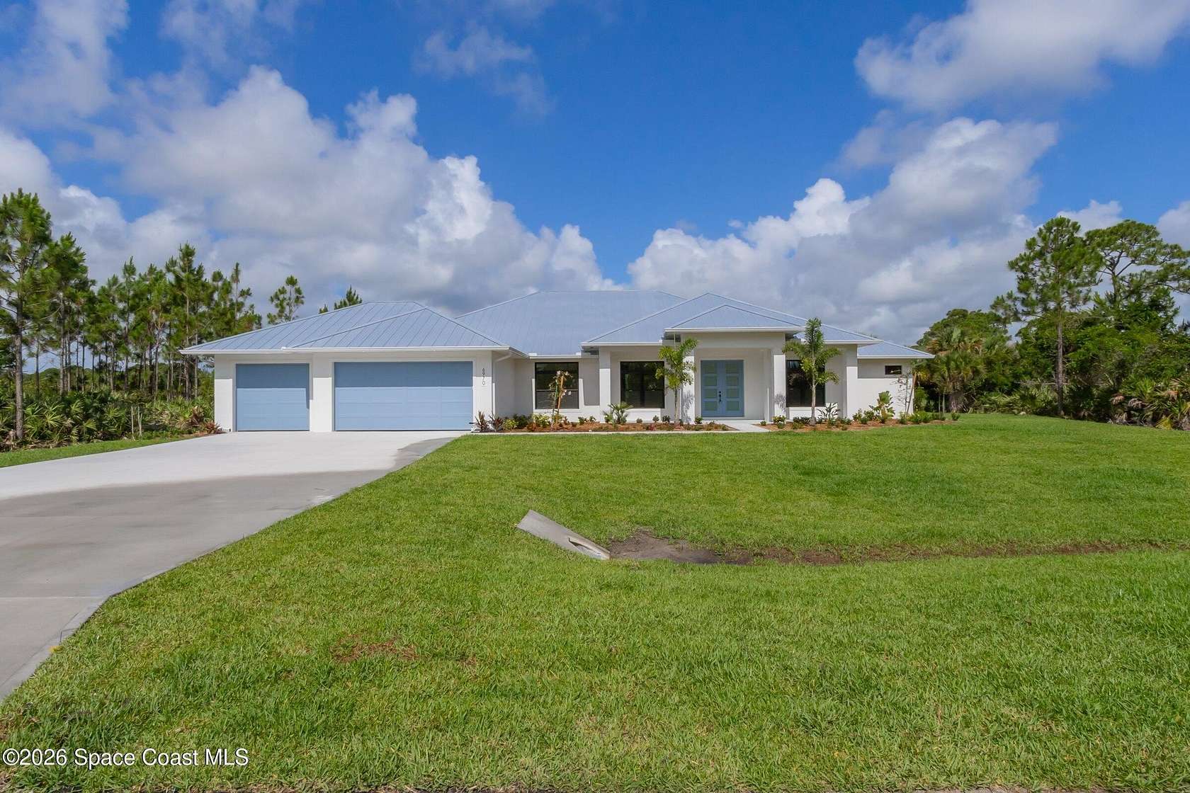 2.65 Acres of Land with Home for Sale in Palm Bay, Florida