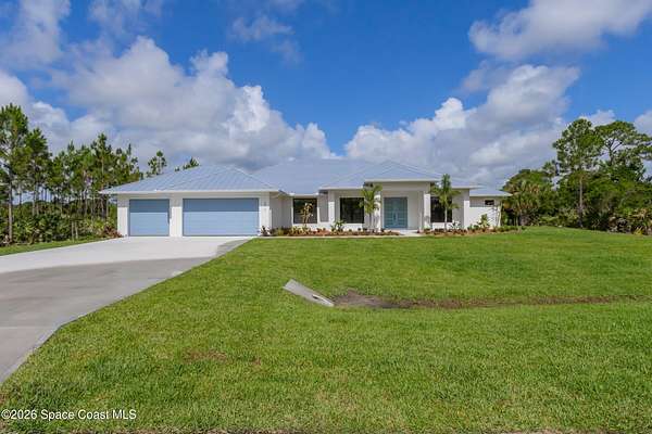 2.65 Acres of Land with Home for Sale in Palm Bay, Florida