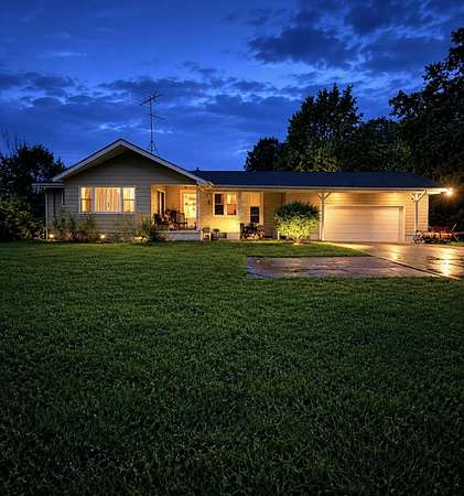1.5 Acres of Land with Home for Sale in Nunica, Michigan