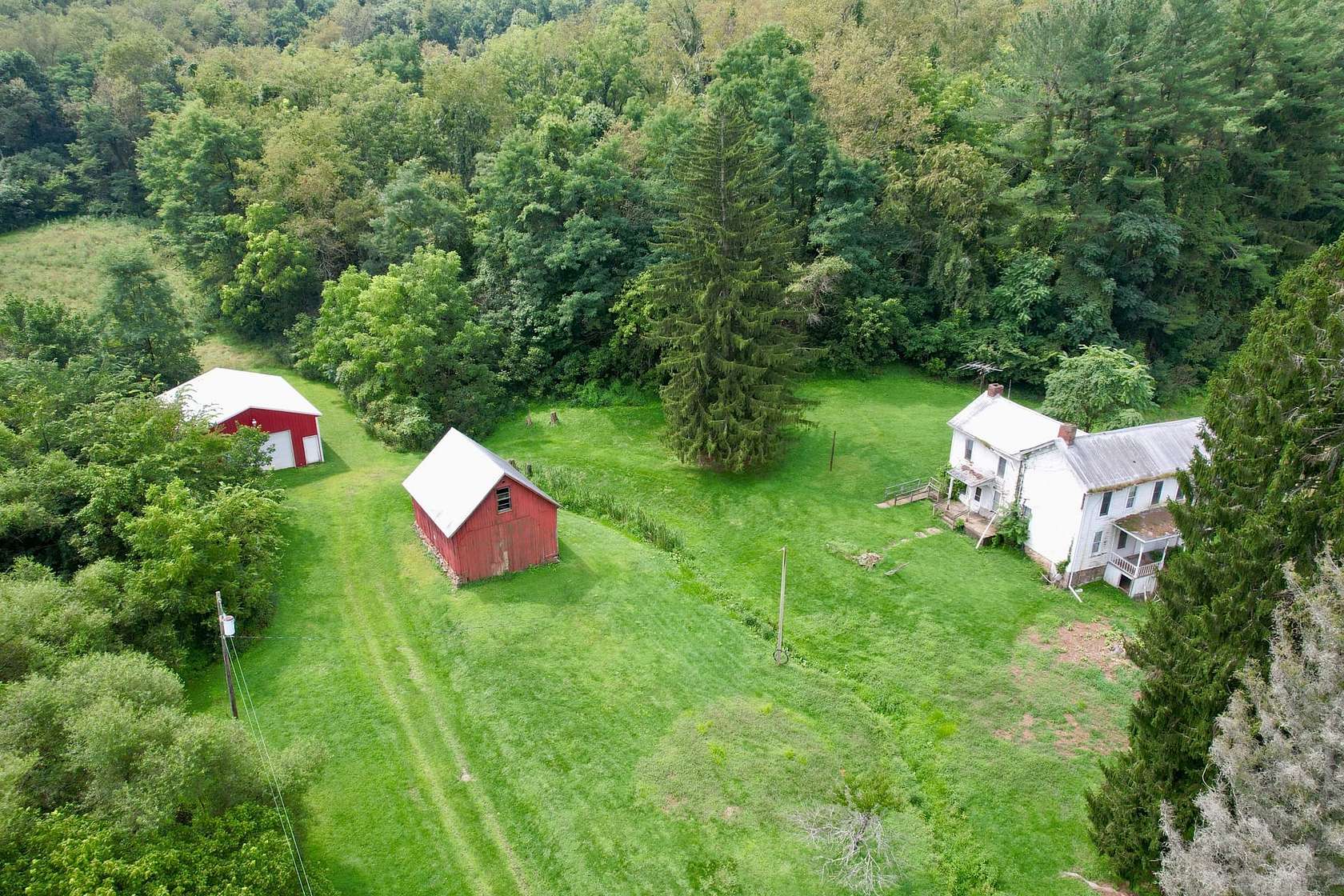 140 Acres of Land with Home for Sale in West Alexander, Pennsylvania