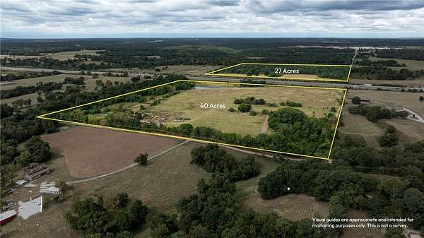 27.7 Acres of Commercial Land for Sale in Gravette, Arkansas