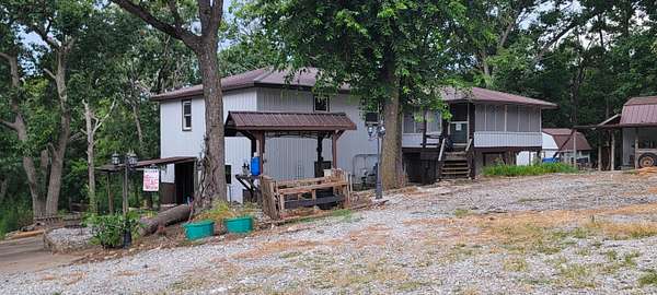 10 Acres of Land with Home for Sale in Hughesville, Missouri