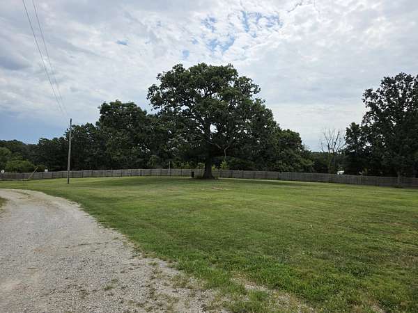 20 Acres of Agricultural Land with Home for Sale in Hartville, Missouri