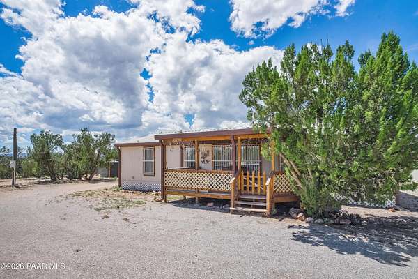 1.64 Acres of Land with Home for Sale in Seligman, Arizona