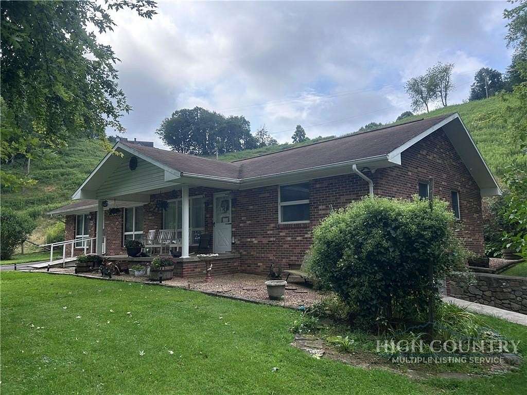 6.8 Acres of Land with Home for Sale in Vilas, North Carolina