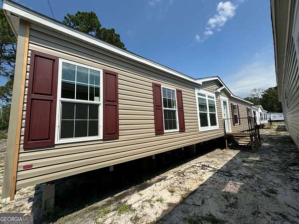 4.3 Acres of Land with Home for Sale in Nahunta, Georgia