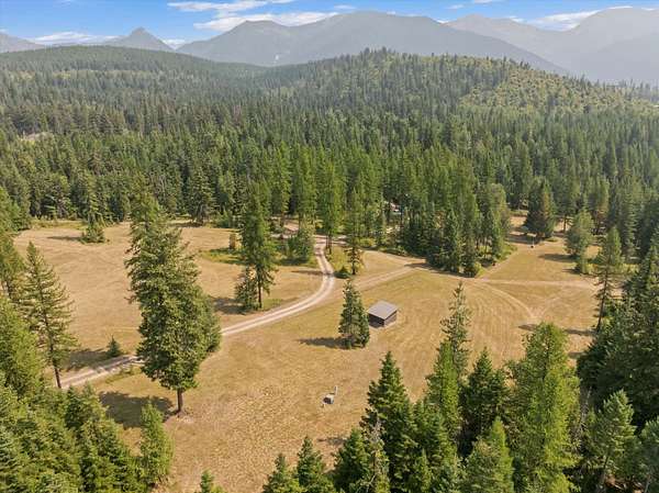 58.6 Acres of Recreational Land with Home for Sale in Kalispell, Montana