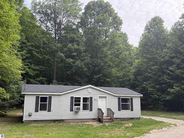 5 Acres of Land with Home for Sale in Beulah, Michigan