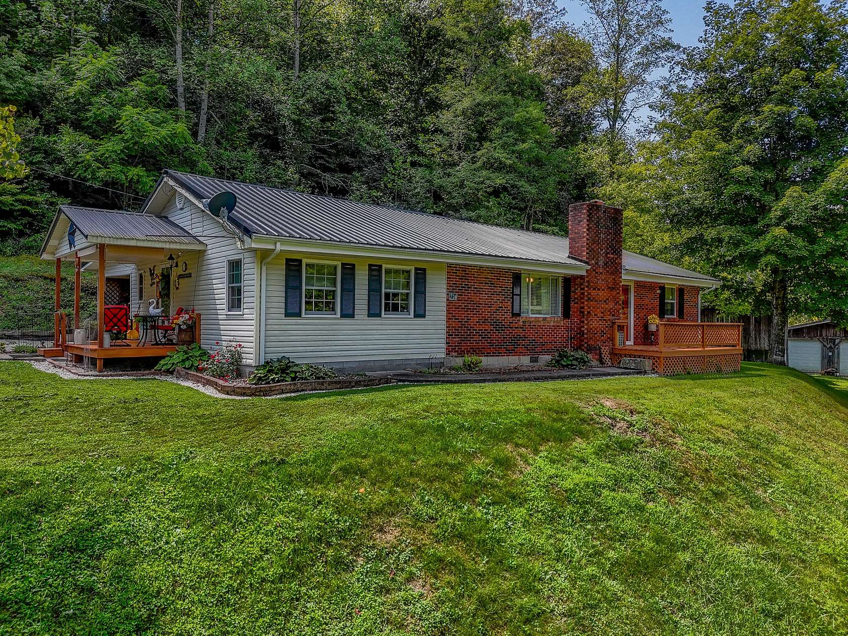 5.6 Acres of Land with Home for Sale in Sandy Hook, Kentucky