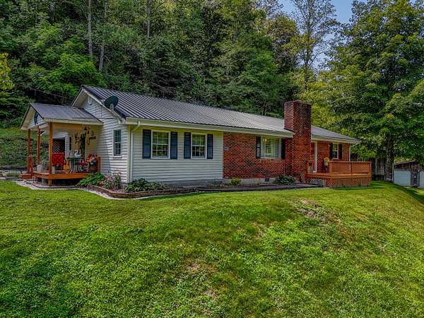 5.6 Acres of Land with Home for Sale in Sandy Hook, Kentucky
