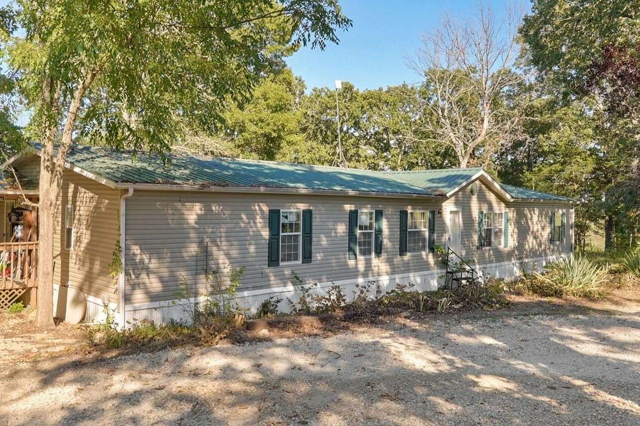 5.43 Acres of Land with Home for Sale in Taneyville, Missouri