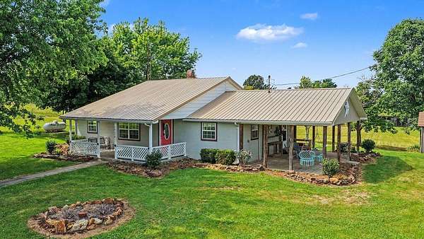 2.51 Acres of Land with Home for Auction in Dawson Springs, Kentucky
