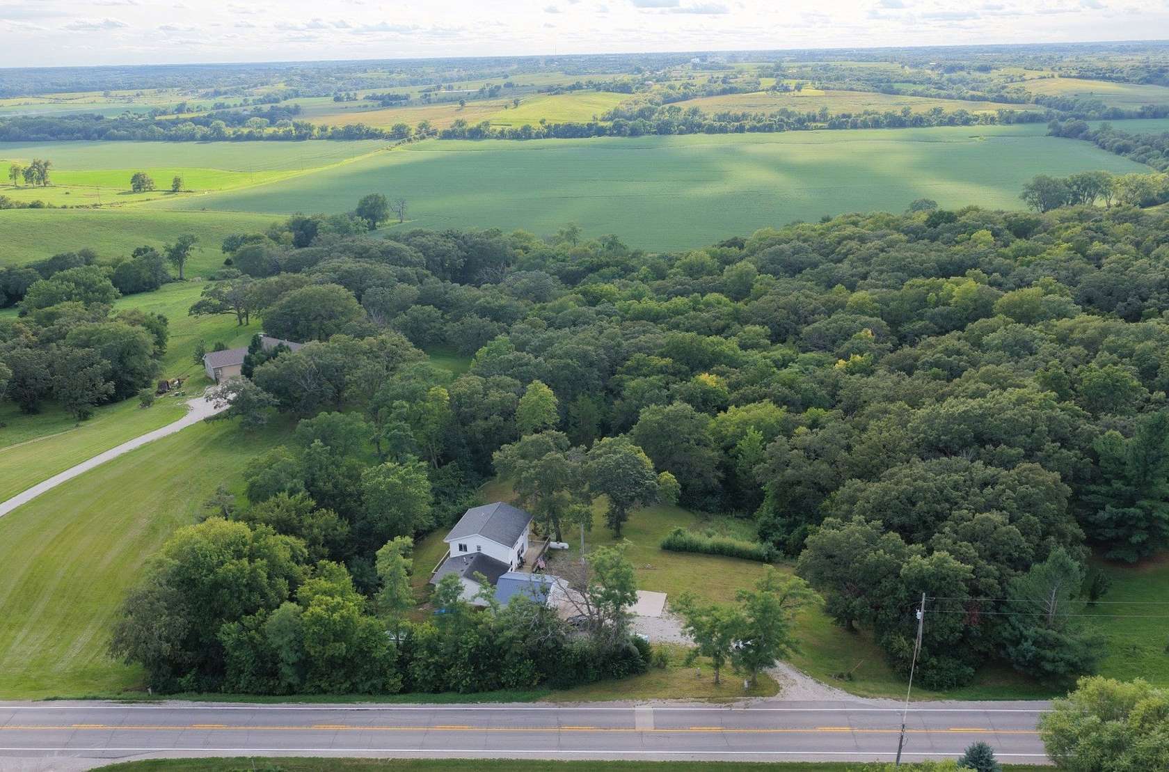 5.79 Acres of Land with Home for Sale in Indianola, Iowa