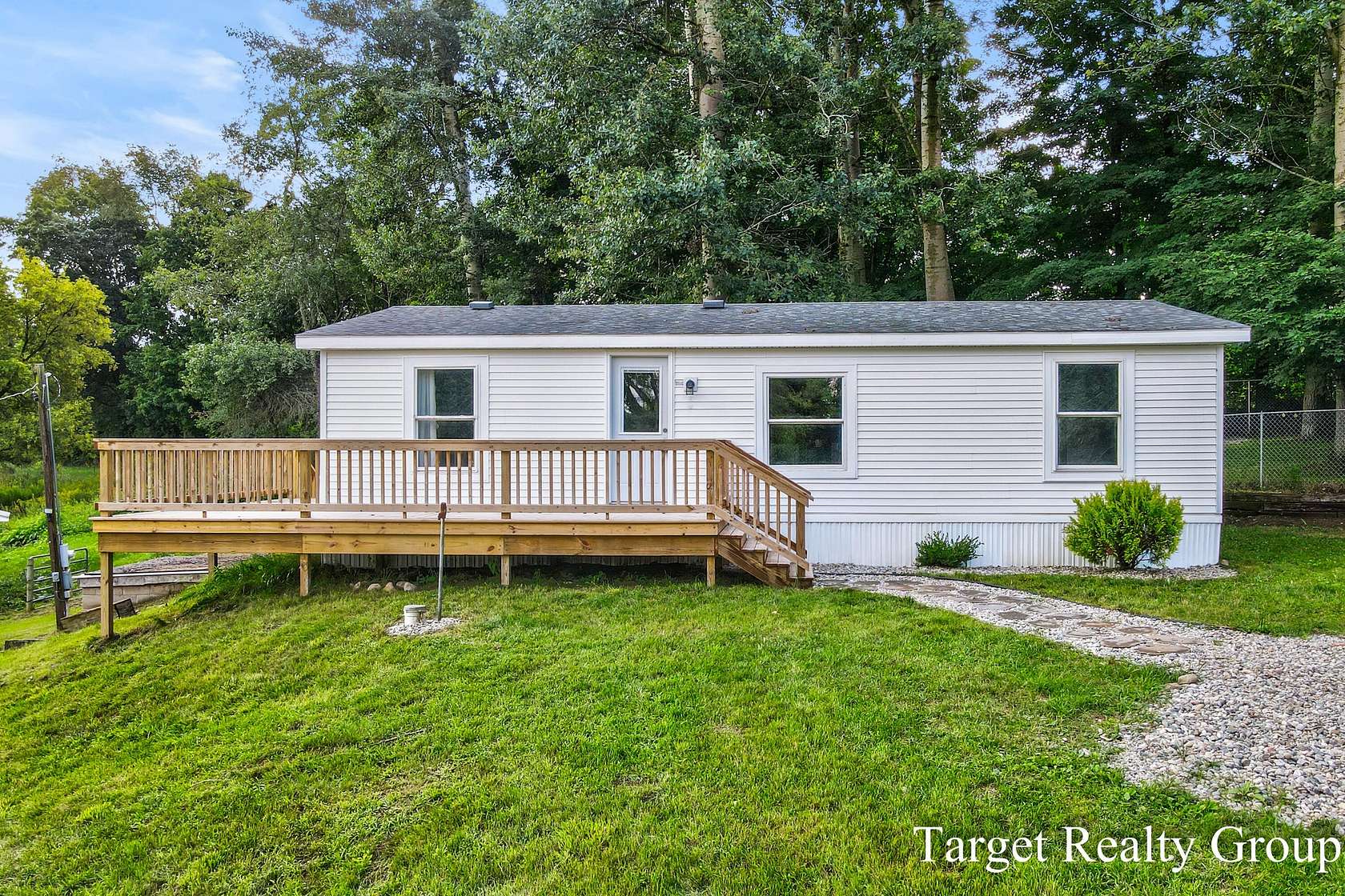 3 Acres of Land with Home for Sale in Belding, Michigan