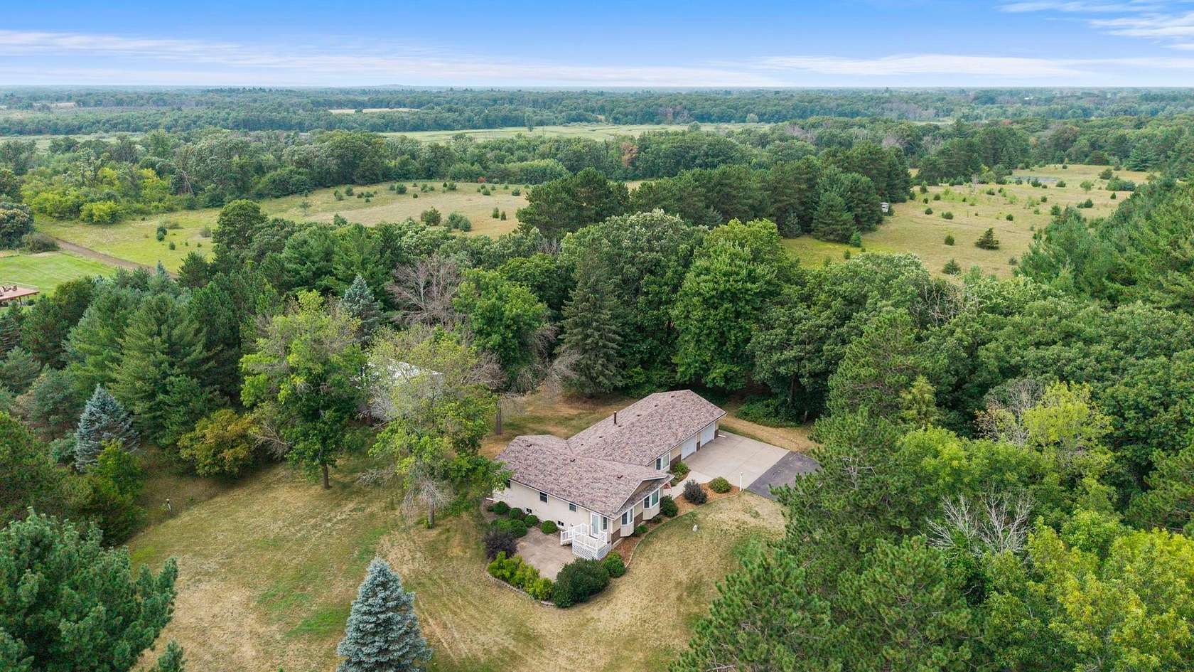 2.4 Acres of Land with Home for Sale in Zimmerman, Minnesota