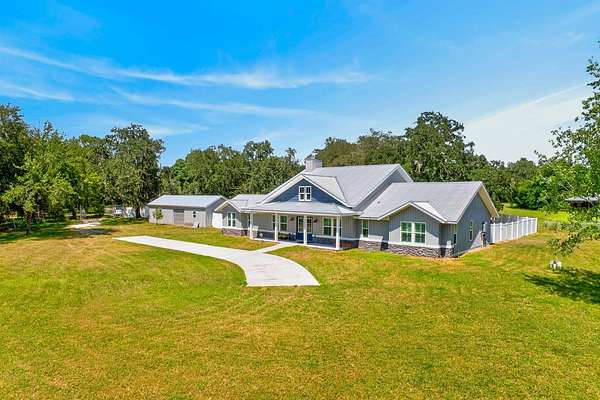 3.55 Acres of Land with Home for Sale in Hudson, Florida