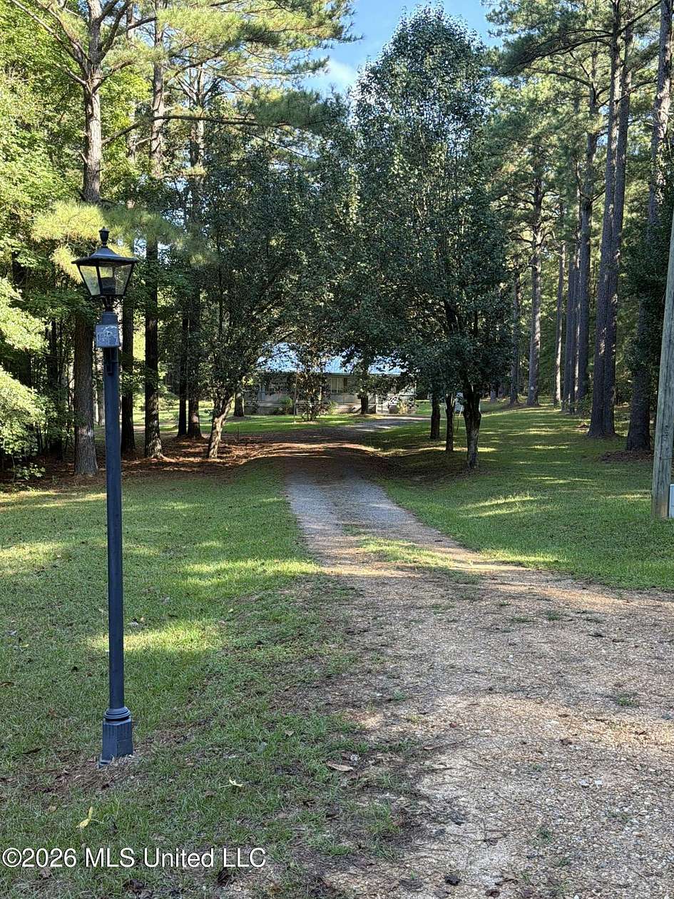 3.25 Acres of Land with Home for Sale in Brandon, Mississippi