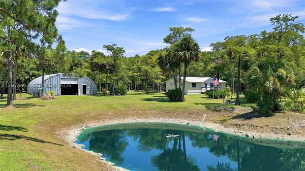 5.23 Acres of Land with Home for Sale in Loxahatchee Groves, Florida