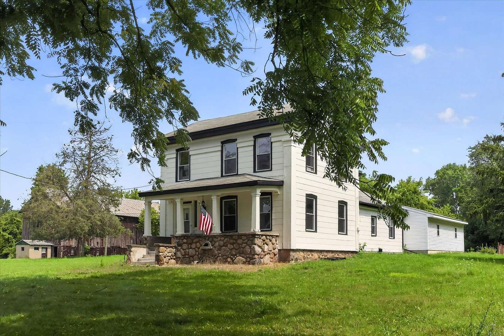 8 Acres of Land with Home for Sale in Comstock Park, Michigan