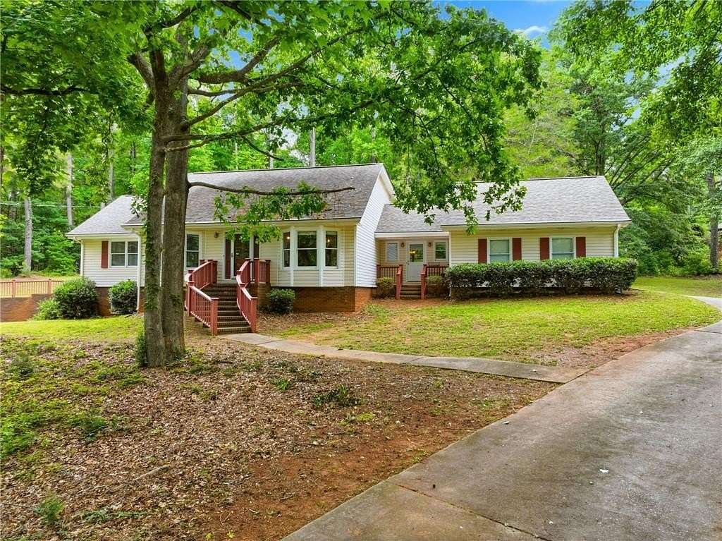 2.35 Acres of Land with Home for Sale in Conyers, Georgia