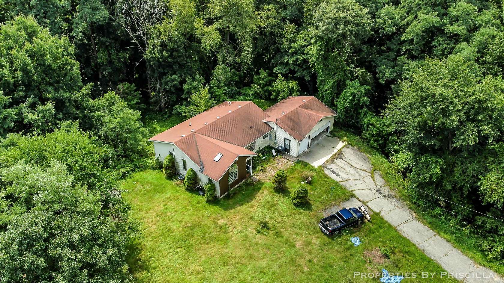 3.33 Acres of Land with Home for Sale in Sparta, Michigan